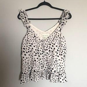 Lost in lunar peplum top M